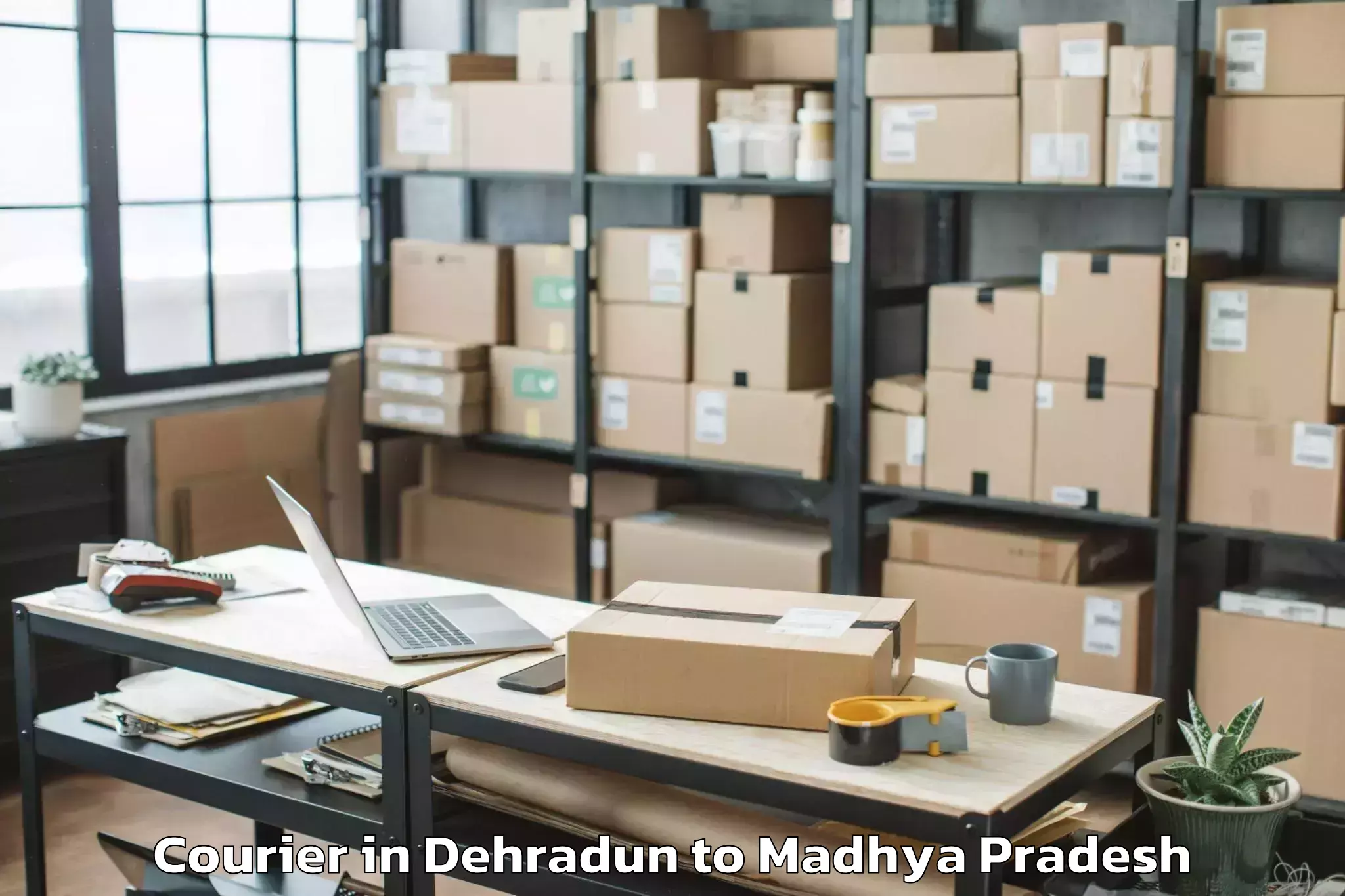 Book Dehradun to Rahatgaon Courier Online